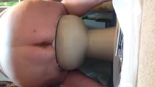 She's pooping on a newspaper