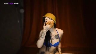 Tattooed girl eating poop sensually