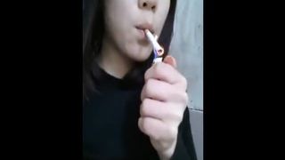 Dark haired teen shitting