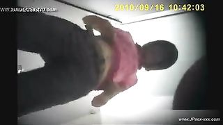 Spying on two Asian girls shitting