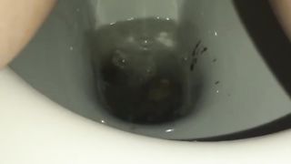 Hairy babe pooping in toilet