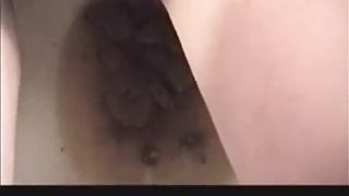 Brown haired babe farting and shitting