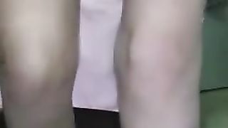 Beautiful brunette gets naked to poop