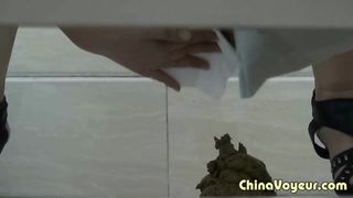 Spying on a Chinese girl that's shitting