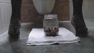 Hot wife pooping in a glass