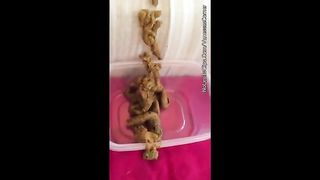 Teen shitting in plastic lunch box