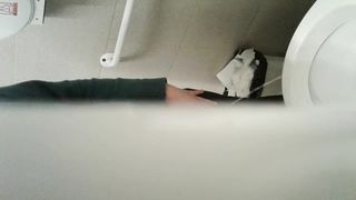 Peeing in the office wc.