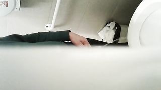 Peeing in the office wc.