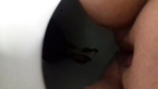 Close up of shaved babe shitting