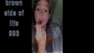 She's fingering her pussy while pooping