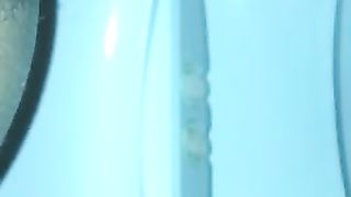 Pushing big turd over toilet