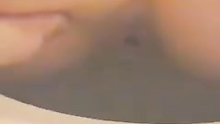 Vintage video of a sexy milf shitting