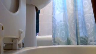 Chubby babe shitting and peeing