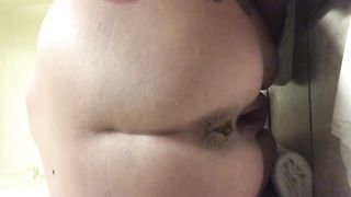 Sexy babe shitting on her knees