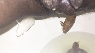 Creampied black girl shitting in toilet