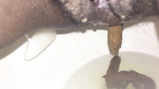 Creampied black girl shitting in toilet