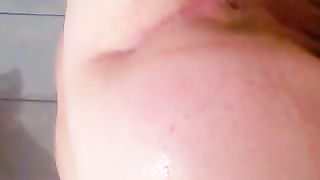 Chubby wife shitting in bathtub