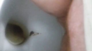 Hairy babe peeing and shitting