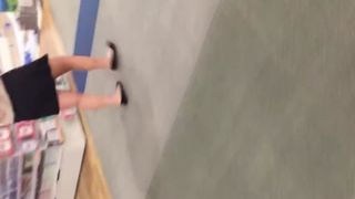 Women shitting in public bathroom