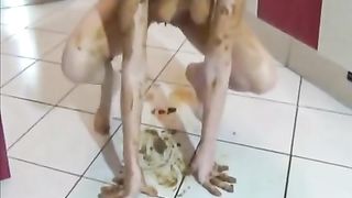 Dark haired babe smears poop on her nude body