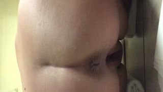 Chubby girl pooping on her knees