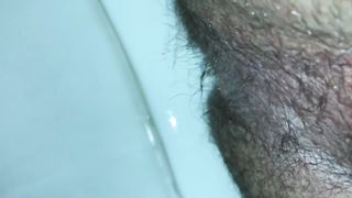 Hairy babe shitting in toilet