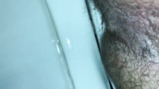 Hairy babe shitting in toilet