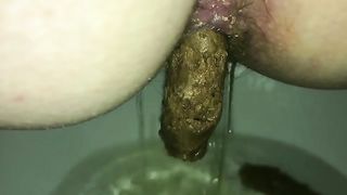 Huge turd from a hairy ass
