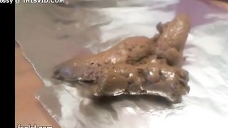 Beautiful teen shitting on her knees