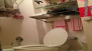 Spying on a milf shitting