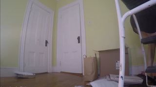 Masked brunette shitting on bedroom floor