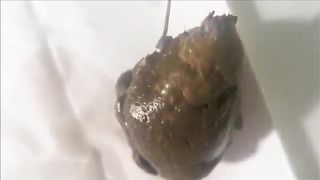 Masked girl eating her own shit