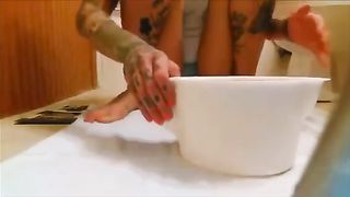Tattooed blonde masturbates with a lot of shit