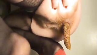Close up of horny milf shitting