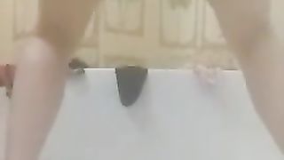 Shitting in doggystyle position