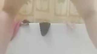 Shitting in doggystyle position