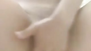 Fingering cunt while shitting