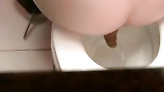 Close up of sweet babe shitting