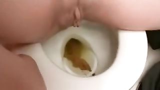 Close up of sweet babe shitting