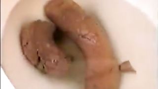 Ebony girl with curly hair pooping