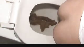 Blonde babe using a public bathroom