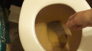 Playing with her big turds