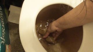 Playing with her big turds