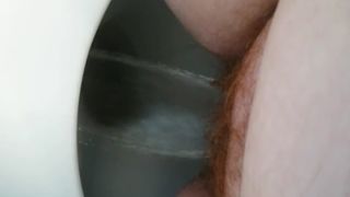 Hairy babe shitting