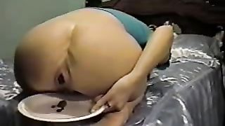 Blonde babe shits on white plate
