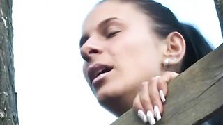 Two girls poop by turn outdoor