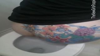 Giant turd from tattooed ass