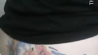 Giant turd from tattooed ass