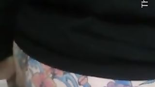 Giant turd from tattooed ass