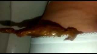 She's pooping in white panties